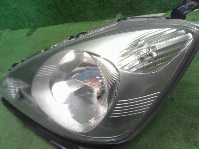 フィット DBA-GE8 左ヘッドランプ　ヘッドライト 助手席側 スタンレー 33151-TF0-J01 自社品番250146