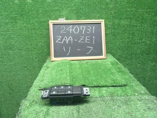 【中古】リーフ ZAA-ZE1 運転席スイッチパネル 25193-5SA0A 自社品番240731 K23