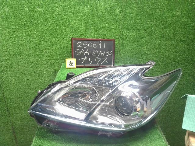 【中古】プリウス DAA-ZVW30 左ヘッドランプ　ヘッドライト　 自社品番250691 040
